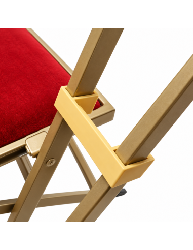 Détail structure acier et système de pliage chaise velours rouge