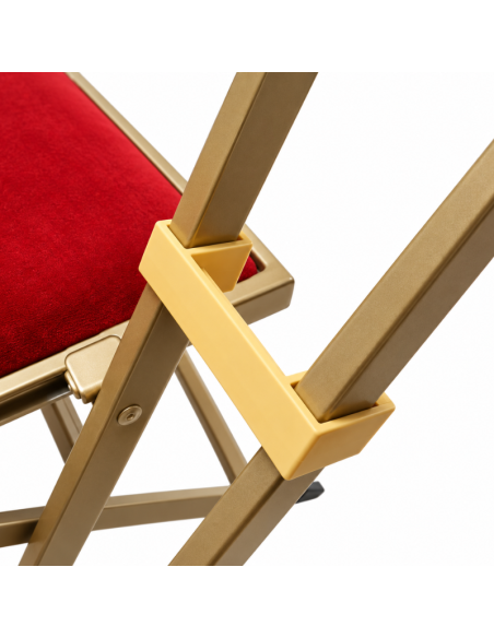 Détail structure acier et système de pliage chaise velours rouge